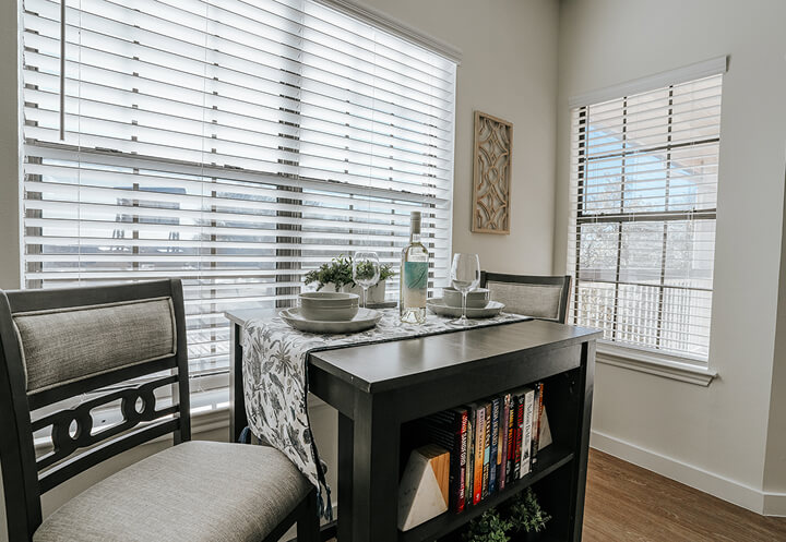 Elegant Table Setting Beside a Window at Independent Living Facility Elegant Table Setting Beside a Window at Independent Living Facility