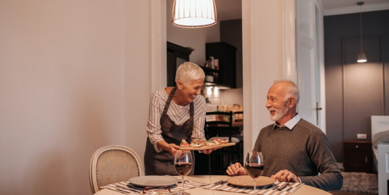 Senior Couple Sharing a Meal Together at an Independent Living Facility