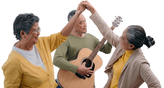 Elderly Women Dancing While a Man Plays Guitar at an Independent Living Community Elderly Women Dancing While a Man Plays Guitar at an Independent Living Community