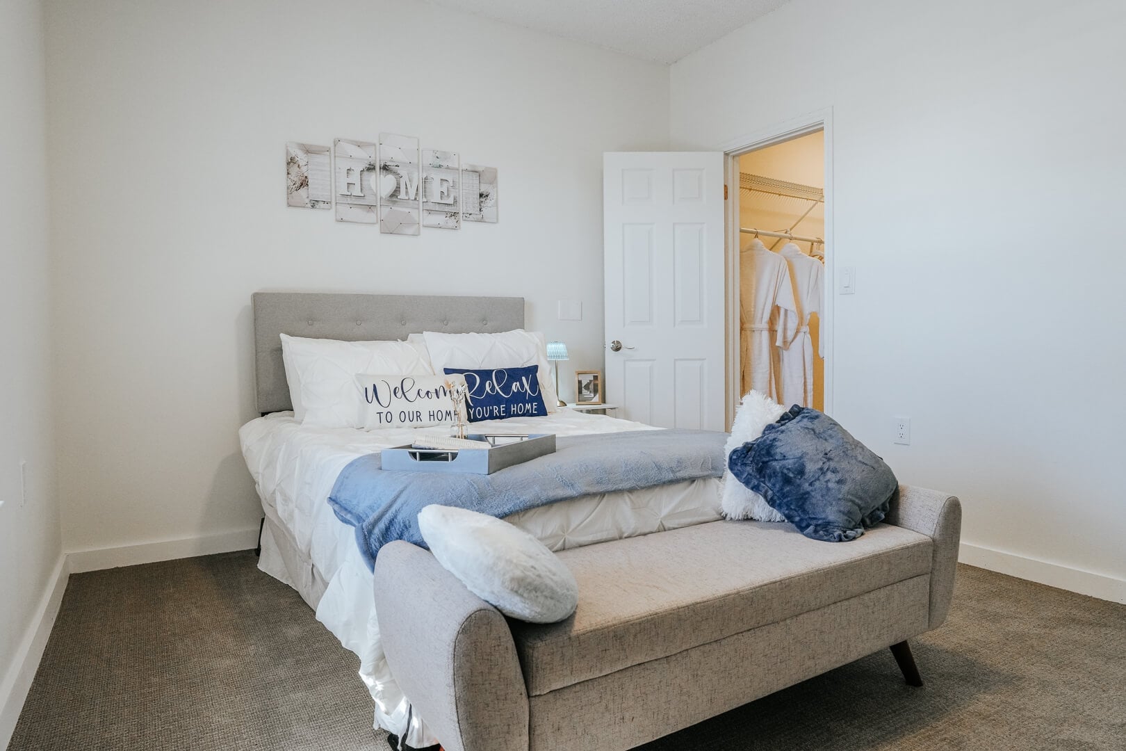Comfortable Furnished Bedroom with Soft Bedding inside Our Independent Living Community