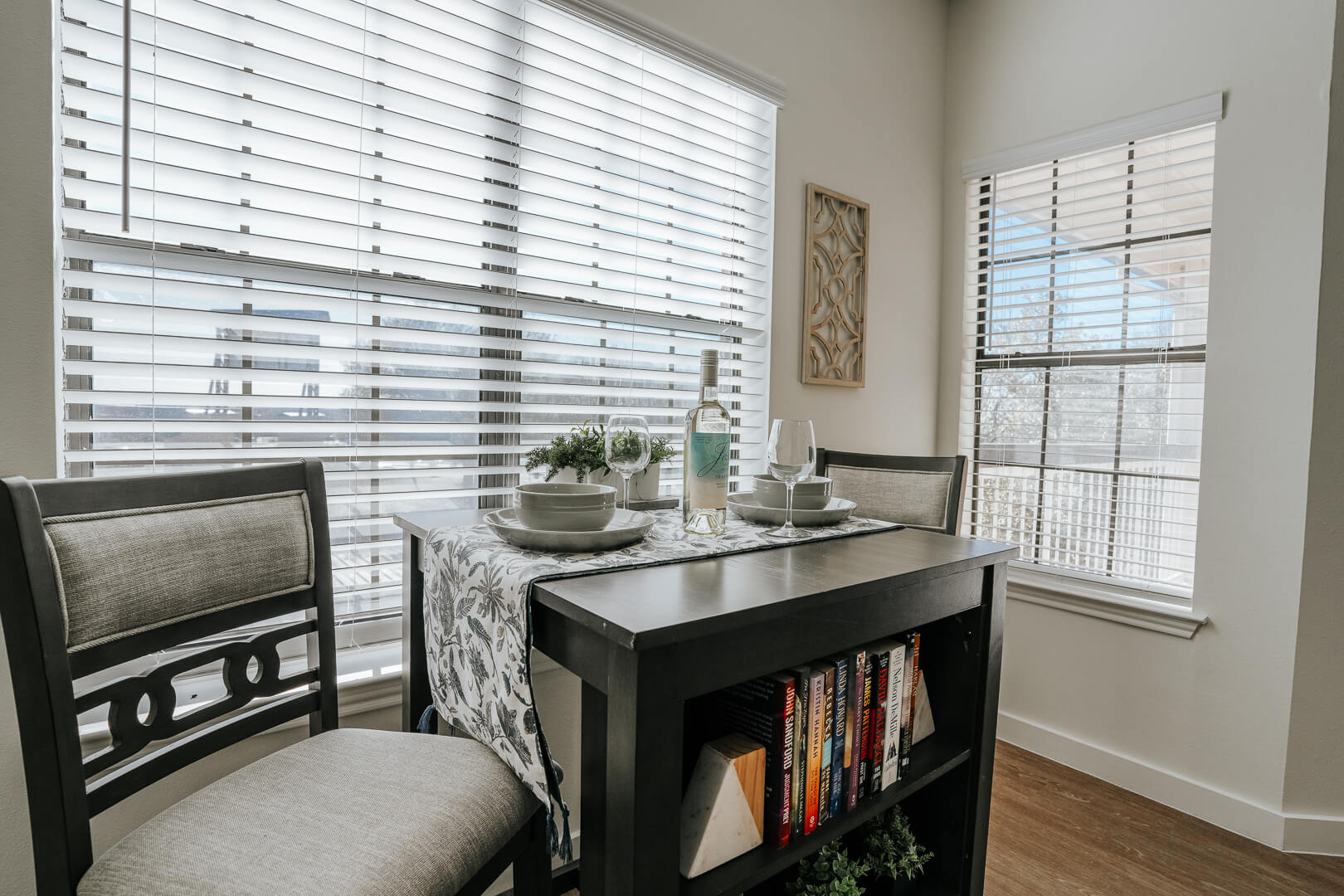 Cozy Dining Nook with Table and Bright Windows at Independent Living Facility