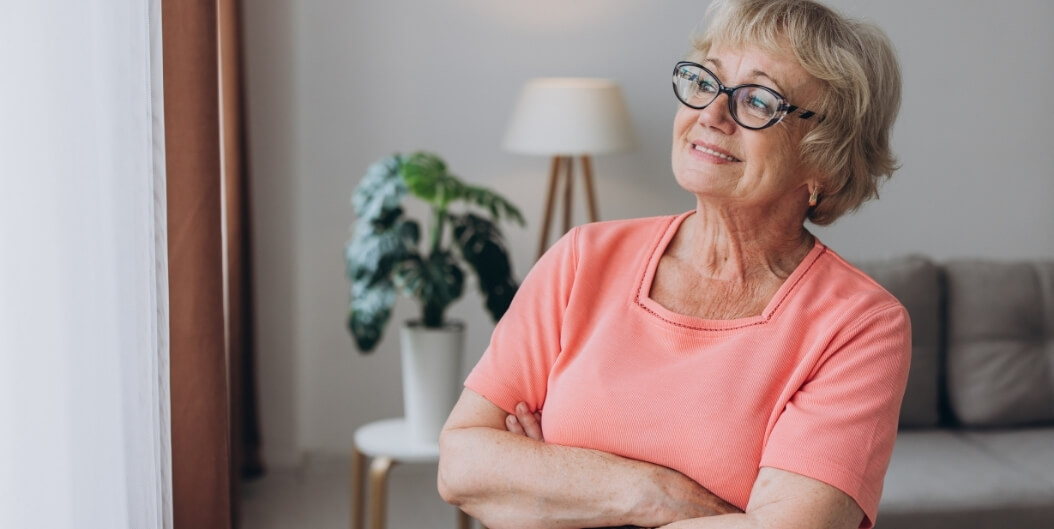 Elderly Woman Smiling Warmly on First Day at Independent Living Facility